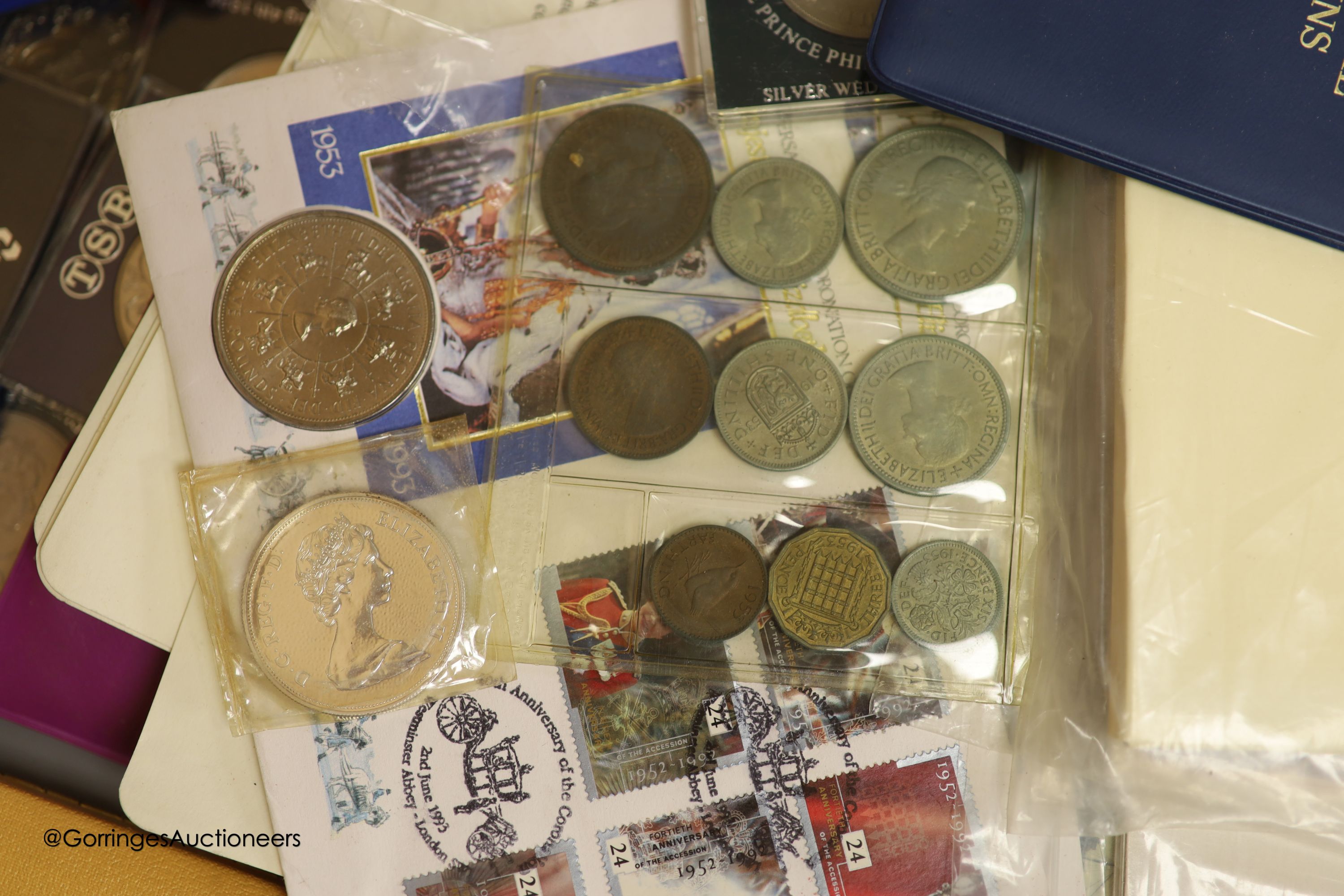 A collection of mostly Royal Mint UK commemorative coins and cover and five UK Brilliant Uncirculated coin collections for 1984 x2, 1986 x2 and 1987.